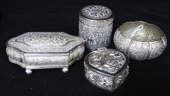 An Indian silver small bowl and three Indian silver boxes including heart shape.